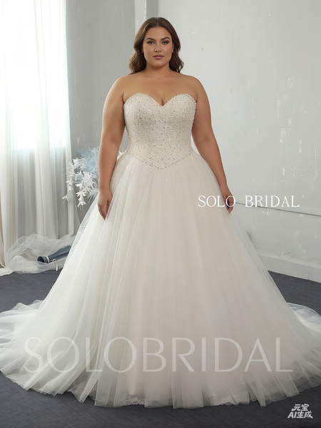 Ivory sweetheart strapless ball gown tulle heavily beaded diamond bodice bridal gowns