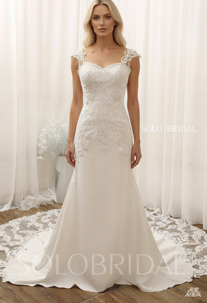 Ivory fit and flare lace cathedral train crepe wedding dress