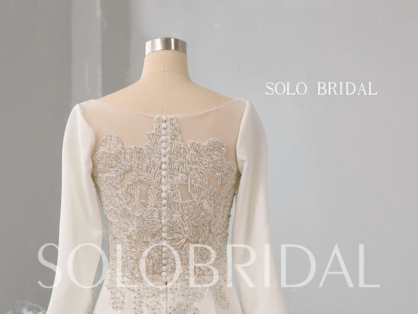 Ivory crepe fit and flare wedding dress 724A3668