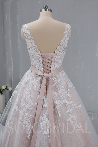 Blush Wedding Dress with Beaded Belt and Corset Back