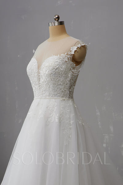 Tulle Wedding Dress with Deep V Neckline and Pearl Buttons