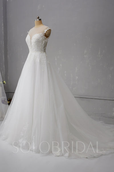 Tulle Wedding Dress with Deep V Neckline and Pearl Buttons