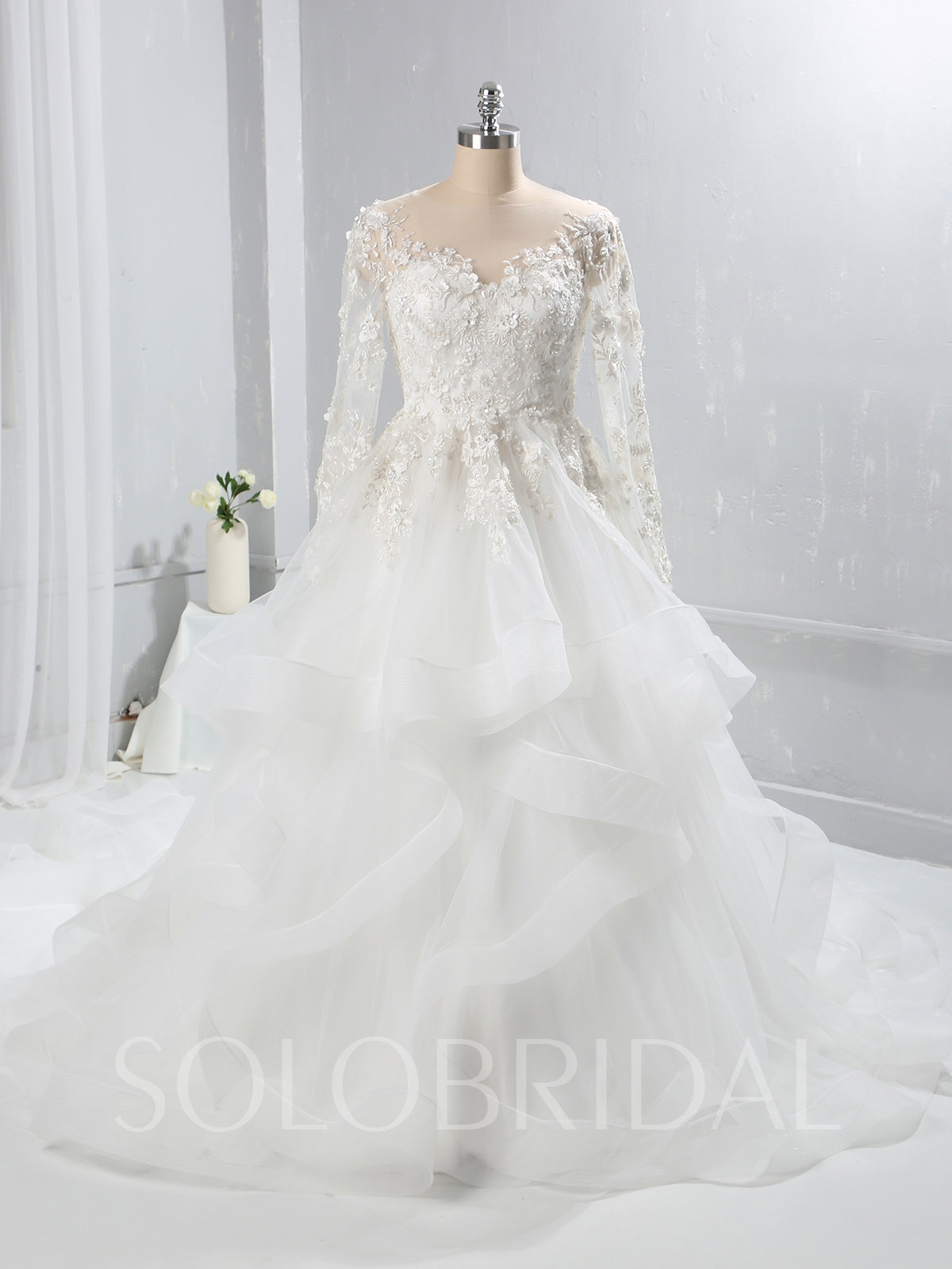 Ivory Lace Bodice Long Sleeve Wedding Dress with Ruffle Skirt and Catherdral Train