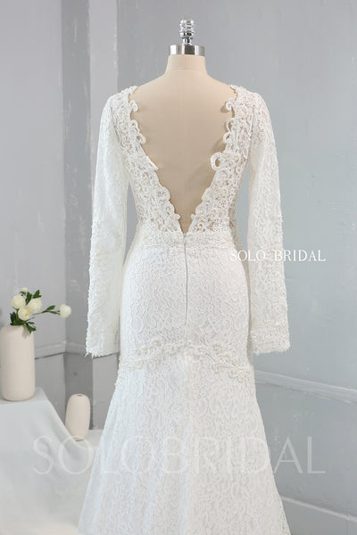 Heavily Pearl Beaded V neck Long Sleeve Wedding Dress with Cathedral Train