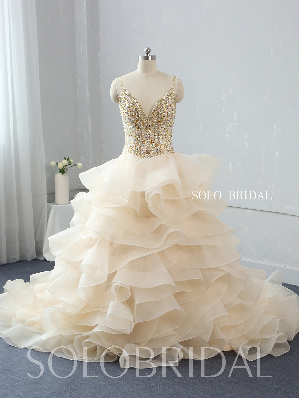 Light Champagne Ruffle Ball Gown Wedding Dress with Sweep Train